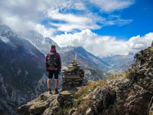 man hiking in mountains